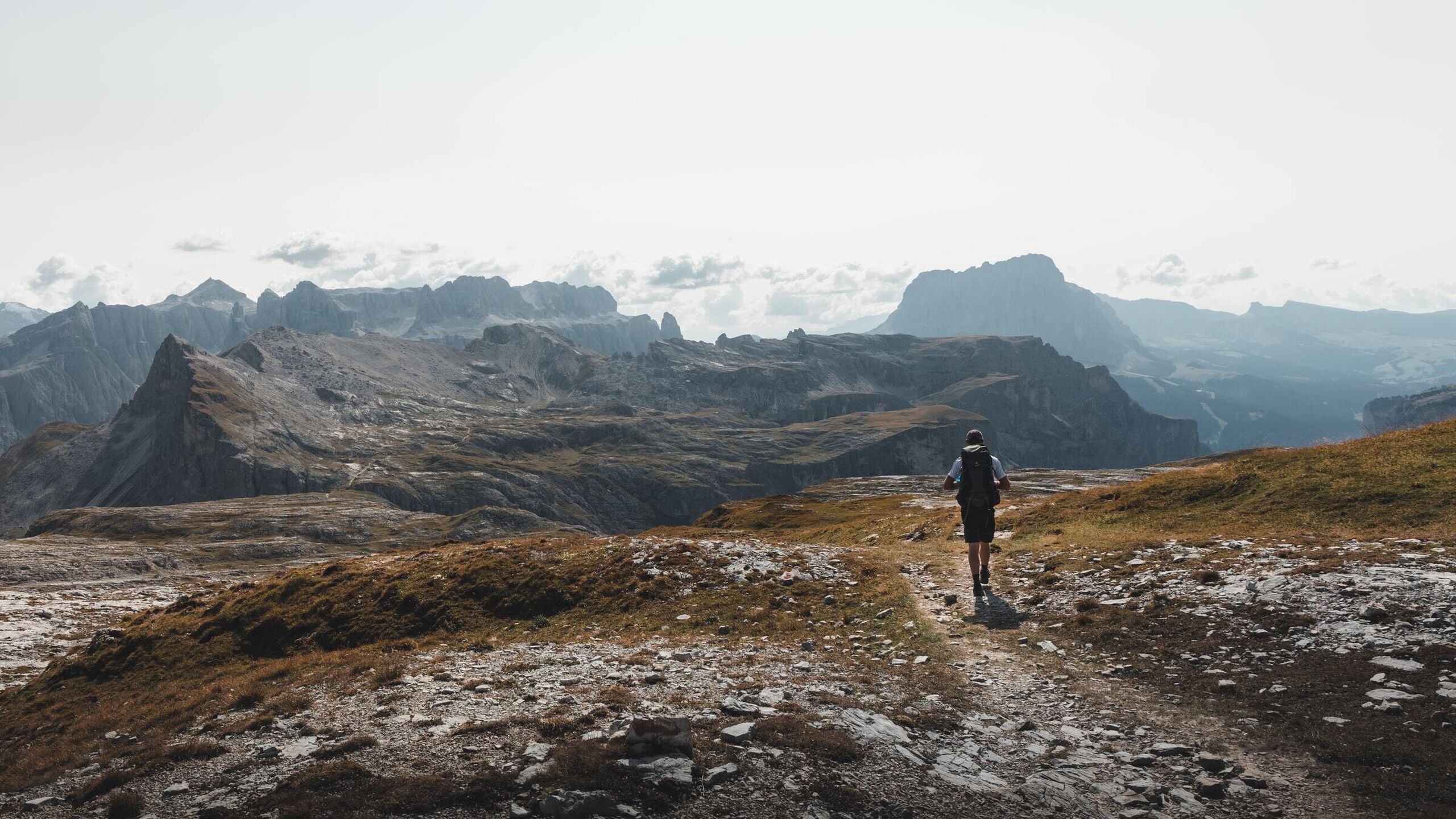 Man hiking in the Dolomites Puez-Odle Natural Park