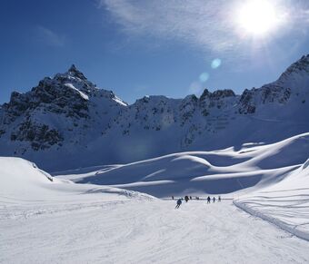 Embark on a captivating ski safari towards the stunning Marmolada glacier