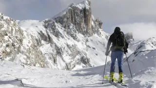 Explore the thrilling world of ski mountaineering and freeride in the majestic Croda da Lago of the Dolomites