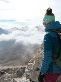 Girl over the top of the dolomites lacrusc santacroce lift