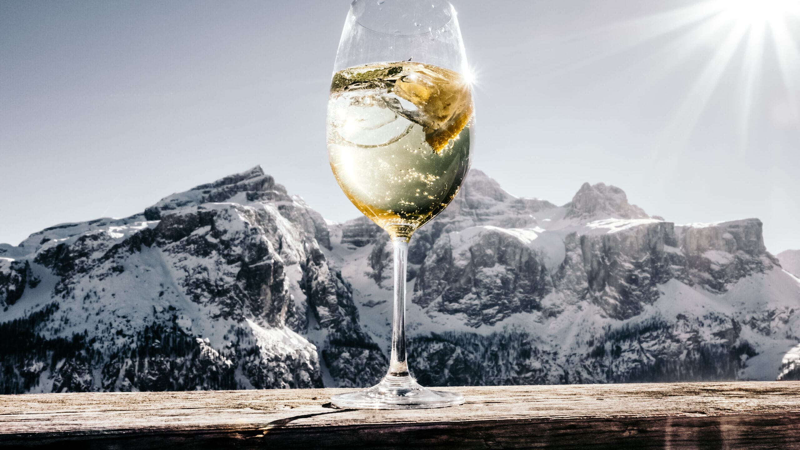 Sipping wine with view on the Sella Massiv in the Italian Alps