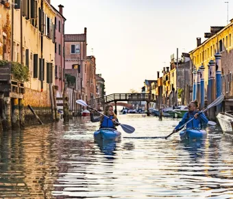 Romantic Canoeing Experience on a Venice Canal