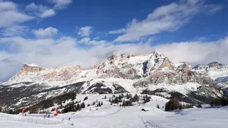 Snowy Dolomites ridge and open piste, Val Badia