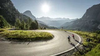 Cyclists on Passo Gardena, Val Gardena, Dolomites, South Tyrol, Italy. Photo: Alex Moling