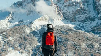 Skier admiring the Dolomites, Photo Eduards Ziborkins