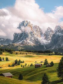 The Sasso Lungo towers over the meadows of the Alpe di Siusi