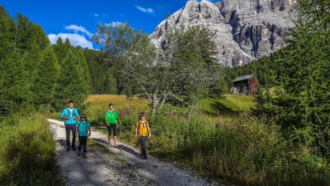 Hiking on the meadows of Armentara, La Val