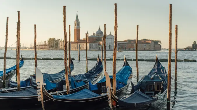 Gondolas with the cathedral in Venice